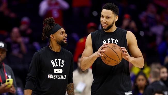 Ben Simmons and Patty Mills take the take the court for warm ups. Picture: Getty Images