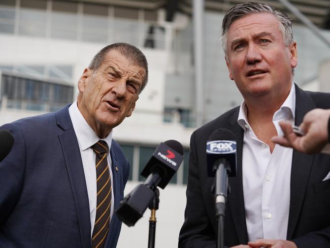 Hawthorn Football Club President Jeff Kennett (left) and Collingwood Football Club President Eddie McGuire during an announcement at the MCG in Melbourne, Wednesday, May 8, 2019. AFL clubs Hawthorn and Collingwood have joined forces to create the 'Emergency Services Match' to help improve support and appreciation of Victoria's emergency workers. (AAP Image/Stefan Postles) NO ARCHIVING