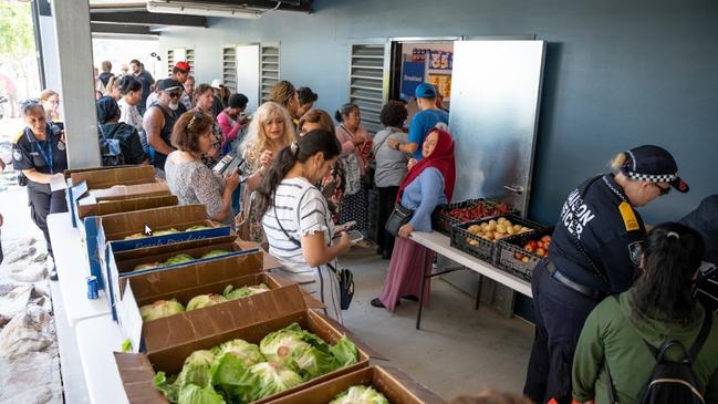 A charity grocery store in Loganholme, where shoppers can pick up 18 items for free. Pictures: Serving Our People