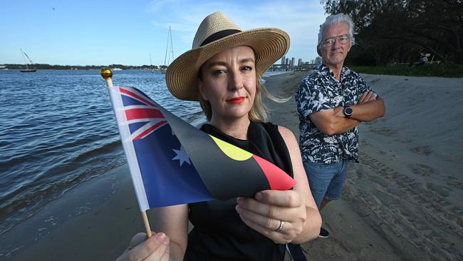 Gold Coast Cr. Brooke Patterson holding the combination flag she has had changed with David Keys, who notified her of the flag, on the beach at Southport. Picture: Lyndon Mechielsen/The Australian.