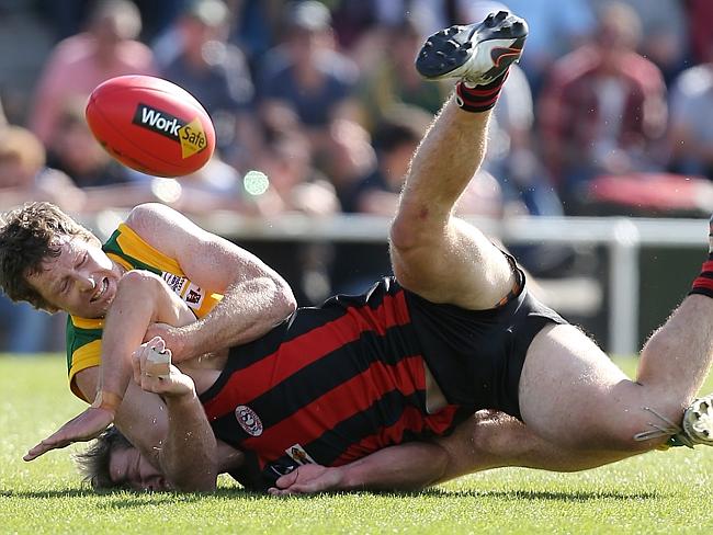 Gippsland Football League Grand Final match between Maffra Eagles and Leongatha Parrots. Maffra became the 2016 premiers, defeating Leongatha 13.10 (88) to 9. 16 (67). Lachlan Channing is tackled to the ground by Hayden Browne. Picture: Yuri Kouzmin