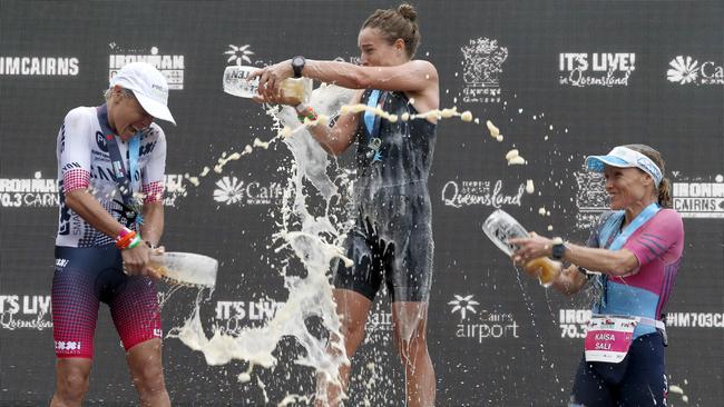 Ironman Cairns 2019 women's second place getter Sarah Crowley, winner Teresa Adam and third place getter Kaisa Sali PICTURE: ANNA ROGERS