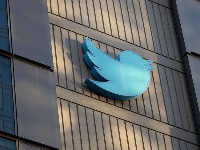 (FILES) In this file photo taken on October 28, 2022 the Twitter logo is seen on the exterior of Twitter headquarters in San Francisco, California. - Twitter owner Elon Musk on March 17, 2023 put out word that he will make public the long-secret algorithm for recommending tweets. The code used for recommending the posts suggested to users will become "open source" at the end of March, Musk said in a tweet of his own. (Photo by Constanza HEVIA / AFP)