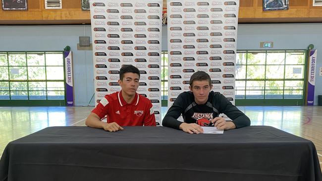 Fellow Central Maine representative Freddy Webb looks on as James Toohey signs a contract with the Mustangs. Picture: Supplied