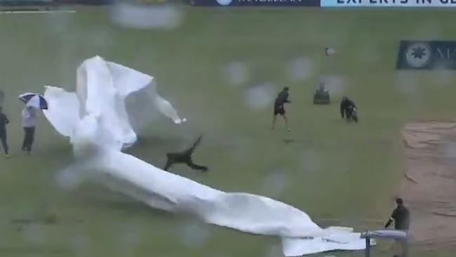 Wild weather at the WACA as groundsman gets wiped out.