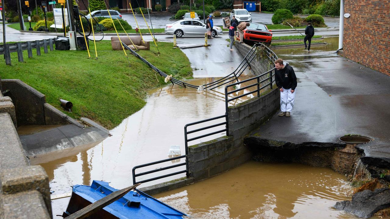 People look at flood damage in Boone, North Carolina. Picture: AFP