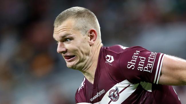 BRISBANE, AUSTRALIA - JULY 24: Tom Trbojevic of the Sea Eagles runs in for a try during the round 19 NRL match between the Manly Sea Eagles and the Wests Tigers at Suncorp Stadium, on July 24, 2021, in Brisbane, Australia. (Photo by Jono Searle/Getty Images)