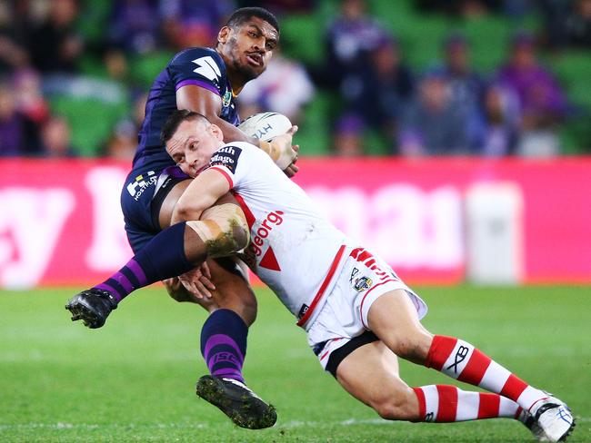 Tui Kamikamica of the Storm is bent back by a Darren Nicholls tackle. Picture: Michael Dodge/Getty Images