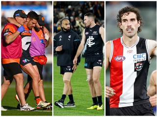 Stephen Coniglio in the hands of the trainers, Adam Saad and Mitch McGovern walk off hurt, Max King of the St Kilda Saints