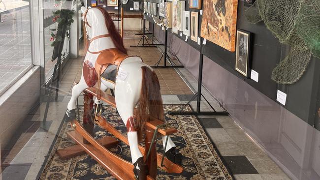 An adult sized rocking horse is part of an arts exhibition in the old IGA building on Summerland Way where patrons can purchase works from local Kyogle artists up until January 11.