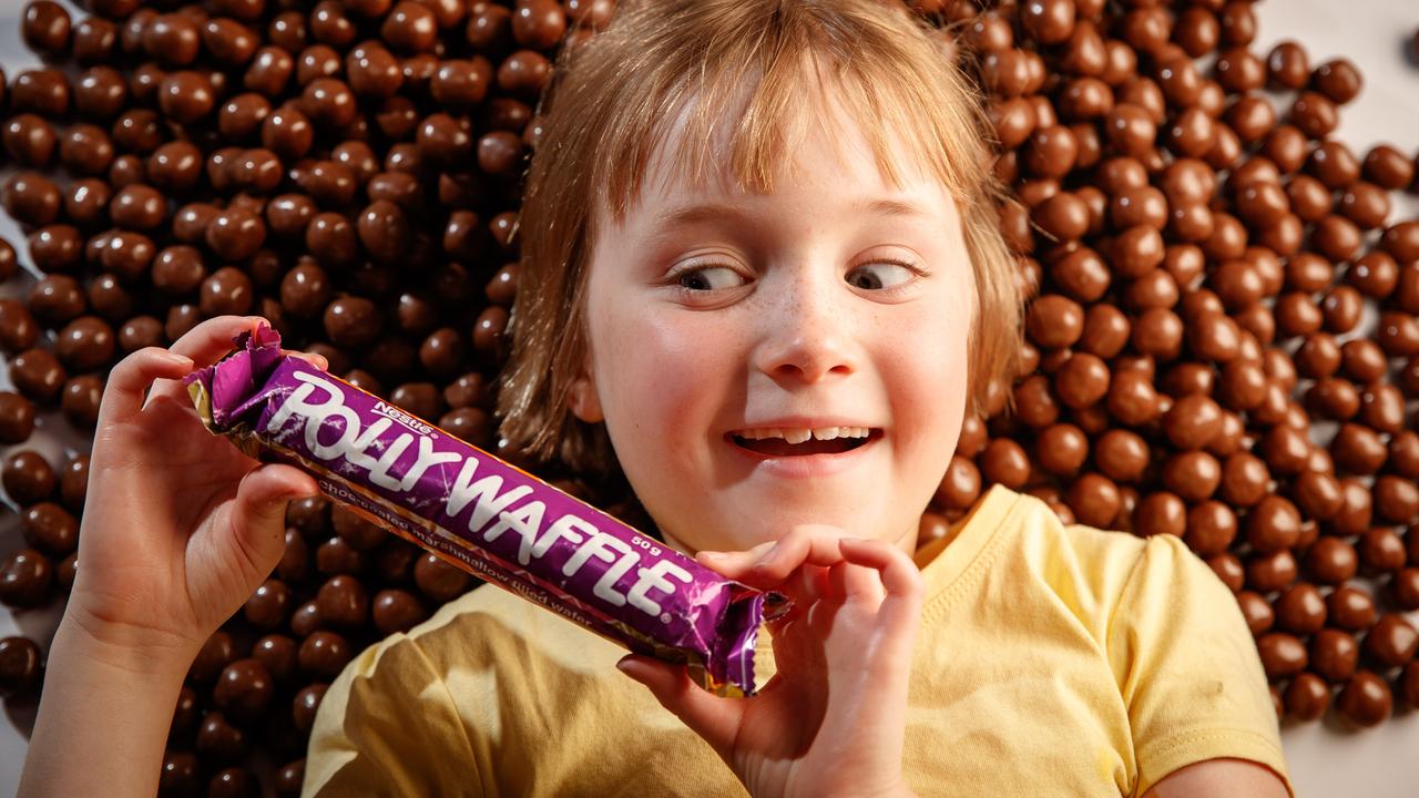 Polly Miller eyes a Polly Waffle while surrounded by Fruchocs. Picture Matt Turner.