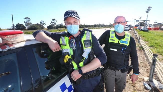 DSC Damian McKeegan and his son Constable Xavier McKeegan who are working a shift at the Little River checkpoint. picture: Glenn Ferguson