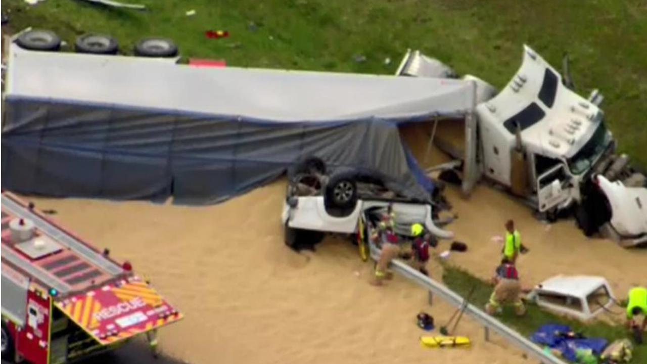 The truck was torn apart, spilling grain over the road