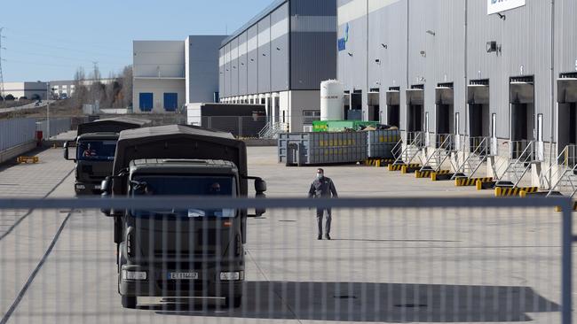 A military convoy escorts a van carrying the Pfizer-BioNTech Covid-19 vaccine in Cabanillas del Campo, Spain. Picture: AFP