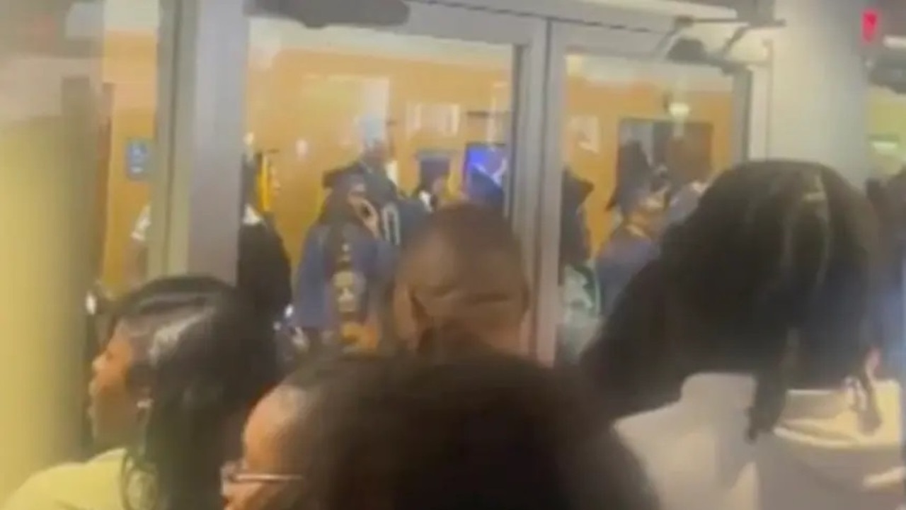 Video showed people standing outside banging on the windows and doors. Picture: Facebook