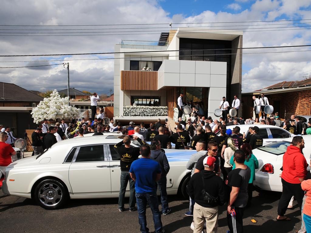 The wedding celebrations take to the streets. Picture: Toby Zerna