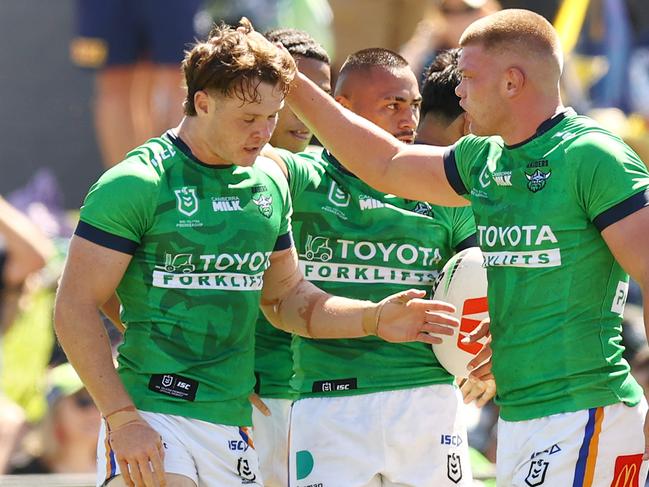 QUEANBEYAN, AUSTRALIA - FEBRUARY 25: Ethan Strange of the Raiders celebrate a try with team mates during the NRL Pre-season challenge match between Canberra Raiders and North Queensland Cowboys at Seiffert Oval on February 25, 2024 in Queanbeyan, Australia. (Photo by Mark Nolan/Getty Images)