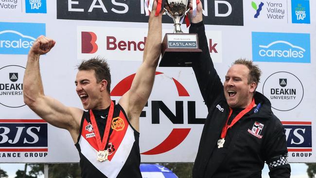 Luke Galliott (right) lifts the 2022 Division 2 cup with Tim Smith. Picture: Davis Harrigan