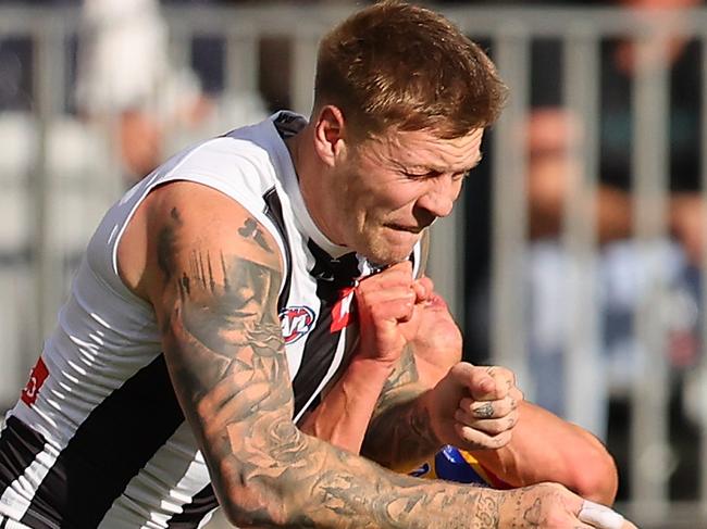 PERTH, AUSTRALIA - JUNE 03: Jordan De Goey of the Magpies bumps Elijah Hewett of the Eagles during the round 12 AFL match between West Coast Eagles and Collingwood Magpies at Optus Stadium, on June 03, 2023, in Perth, Australia. (Photo by Paul Kane/Getty Images)