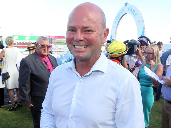 Gold Coast Turf Club race meeting, featuring two major lead in races to the Magic Millions.Photo of race 7. Photo of winner number 9 SNOW VALLEY. Jockey is Robbie Fradd, trainer is Matthew Dunn (pictured).Photo by Richard Gosling