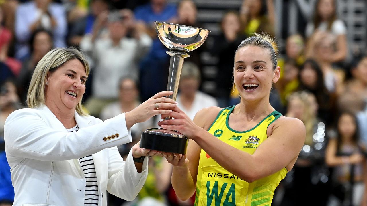 Liz Watson of Australia and Coach Stacey Marinkovich hold up the Constellation Cup after the Constellation Cup match between the Australia Diamonds and New Zealand Silver Ferns at Gold Coast Convention and Exhibition Centre on October 23, 2022 in Gold Coast, Australia. (Photo by Bradley Kanaris/Getty Images)