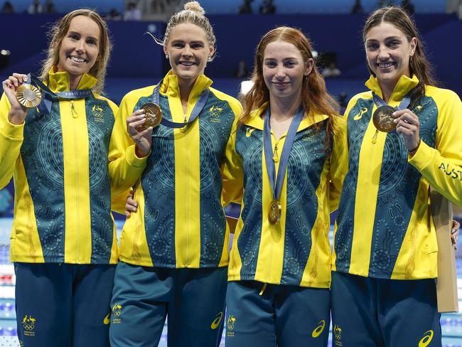 Emma McKeon (left) with Shayna Jack, Molly Callaghan and Meg Harris after winning the 4x100m freestyle relay at the Paris Olympics. Picture: Michael Klein