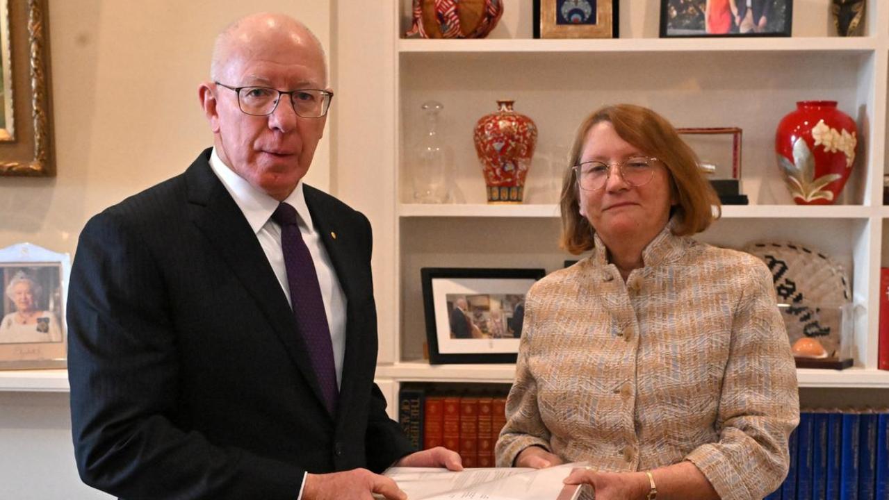 Royal Commissioner Catherine Holmes handing over the report into the Robodebt scheme to Governor-General David Hurley. Picture: News Corp