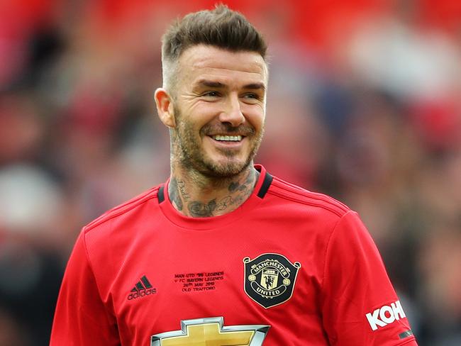 David Beckham playing in a charity match between Manchester United ‘99 Legends and Bayern Munich Legends at Old Trafford last May. Picture: Getty Images