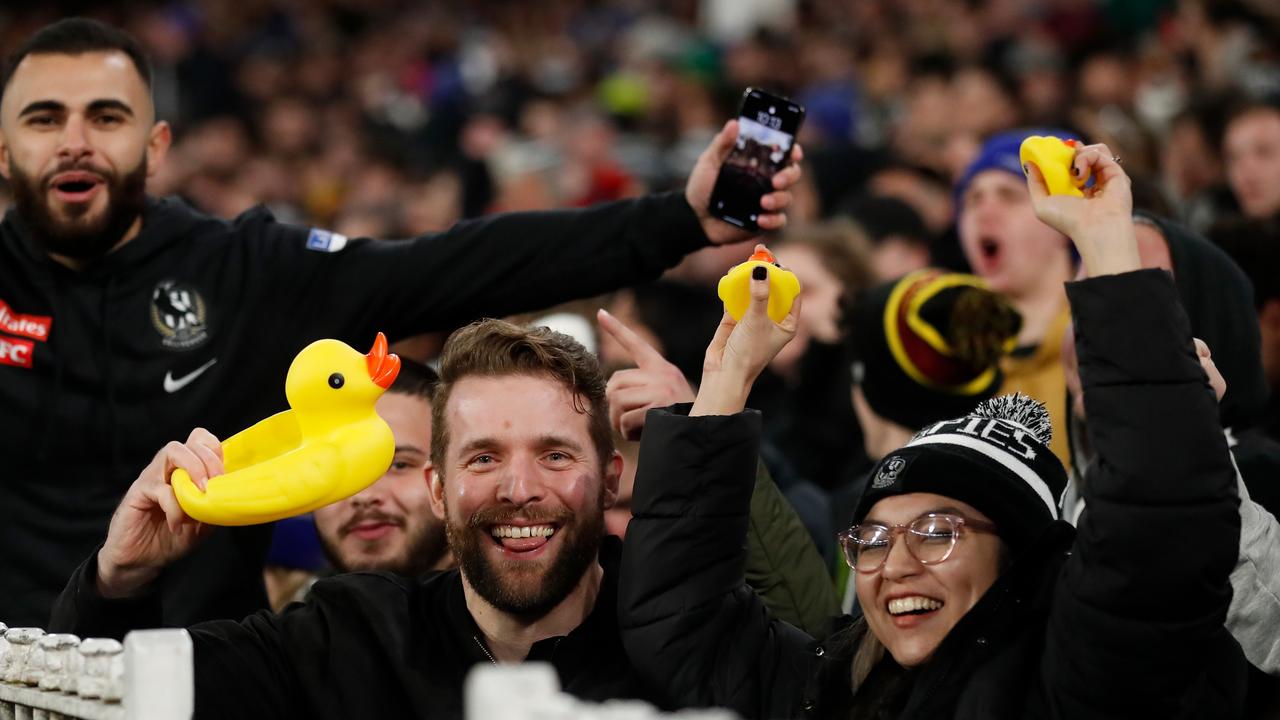 Collingwood fans celebrate their 11th consecutive win — with rubber ducks.