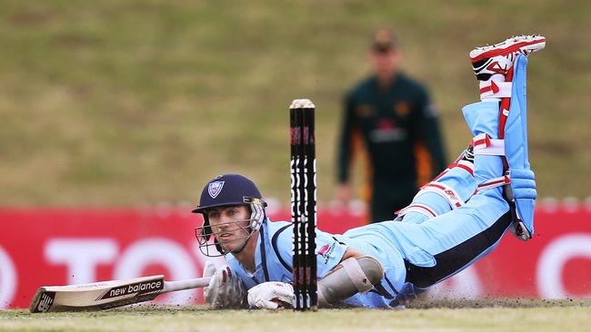 NSW Pat Cummins slides in to his crease going for a run during Matador One-Day Cup NSW v Tasmania at Blacktown Sports Park. (Phil Hillyard)