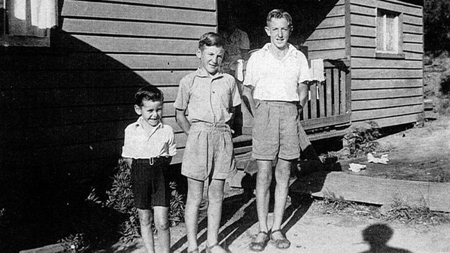 Mike Ryan (left) with his brothers outside the Ryan house on the west side of the Nambucca Station gates. A fettler's house was only modest and the Ryan family of 11 filled every inch with the boys following in their father's footsteps as railway workers. Picture: Nambucca Heads Station Rail Centenary 1923 – 2023 Facebook page