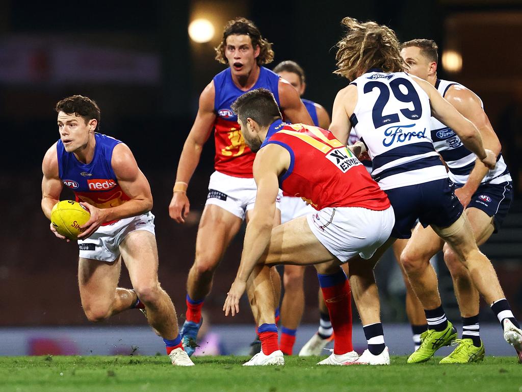 Lions star Lachie Neale (left) bursts away during Brisbane’s loss to Geelong at the SCG. Picture: Cameron Spencer/Getty Images