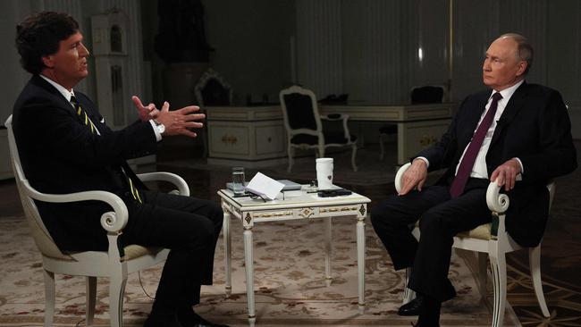 Vladimir Putin gives an interview to US talk show host Tucker Carlson at the Kremlin.