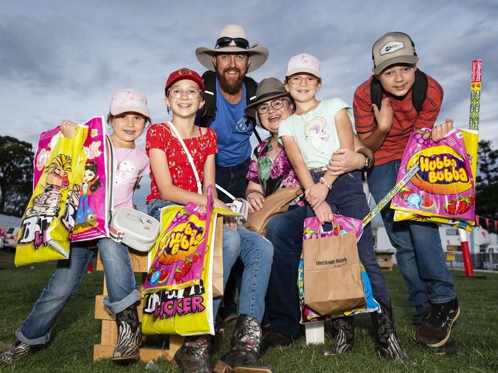 Having a good day are (from left) Scott and Kimberley Myers with kids (from left) Piper, April, Shelby and Lane at the Toowoomba Royal Show, Friday, March 31, 2023. Picture: Kevin Farmer