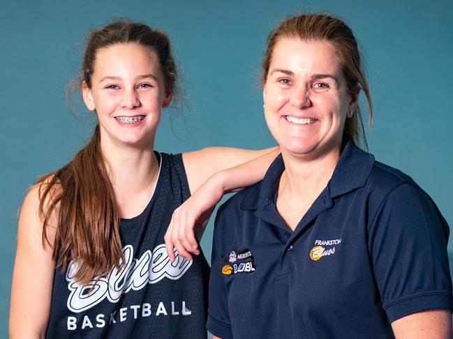 Zoe Fagan, with daughter Tora, 11, is back playing basketball after undergoing experimental stem cell therapy to beat osteoarthritis in her knee. Picture: Sarah Matray