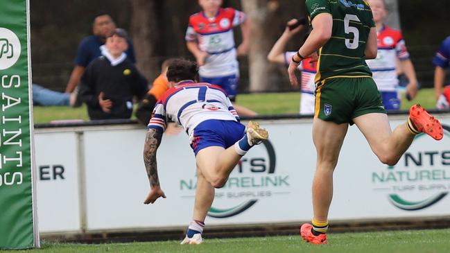 Halfback Jake Stig races away to scores for Emu Plains. Picture: Steve Montgomery