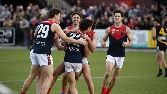 MPFNL Division One Seniors, Grand Final: Dromana FNC Seniors vs Mt Eliza FNC Seniors played at Kinetic Park, Frankston, Victoria, Sunday 15th September 2024. Mt Eliza player Lachlan Williams kicks another goal and celebrates with teammates  Picture: Andrew Batsch