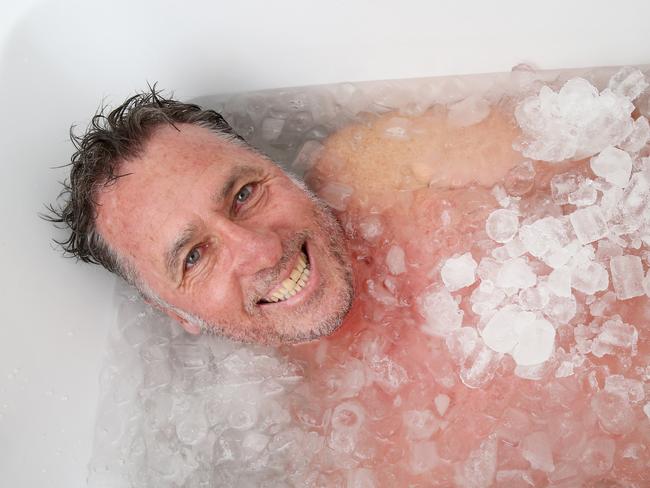 Alan Phillips in his bath at home in Terrigal Friday 1st December 2017 Alan is going to Poland to walk up a snow covered mountain in sub zero tempts dressed only in shorts. Its the culmination of a mind-over-matter course run by Poland's Iceman Wim Hoff. (AAPImage/Sue Graham)