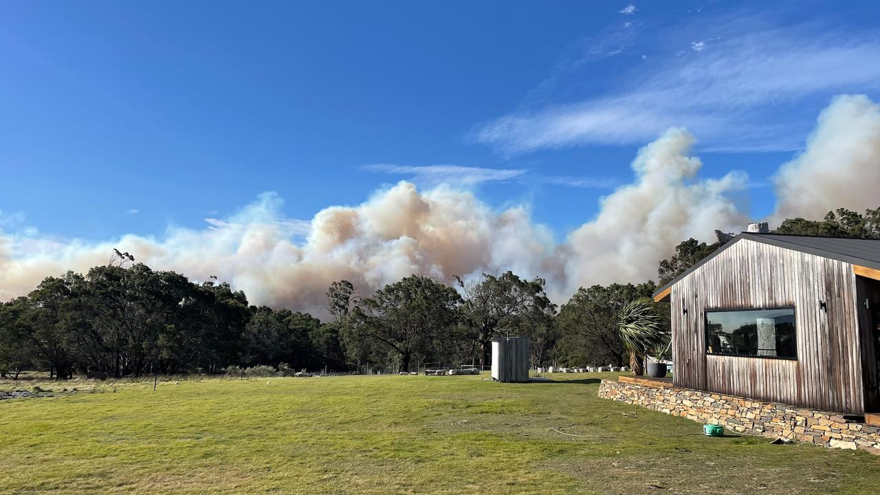 Smoke rising from a fire that closed Coles Bay Rd near Friendly Beaches at 3.15pm on Tuesday, September 19, 2023. Photo: Tombolo Freycinet