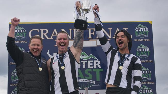 Narre Warren coach Steve Kidd with co-captains Trent Papworth and Joel Zietsman. Picture: Valeriu Campan