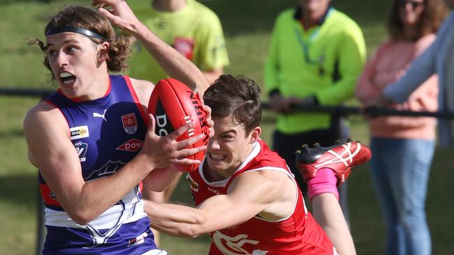 Jhye Clark (left) played some senior football for Queenscliffe last year. Picture: Mark Wilson