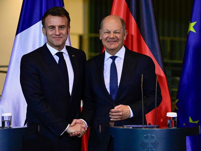 German Chancellor Olaf Scholz (R) and French President Emmanuel Macron shake hands at the end of a press conference at the Chancellery in Berlin on March 18, 2025. Picture: AFP