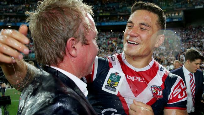 Trent Robinson with Sonny Bill Williams after the Roosters’ grand final win in 2013. Picture Gregg Porteous