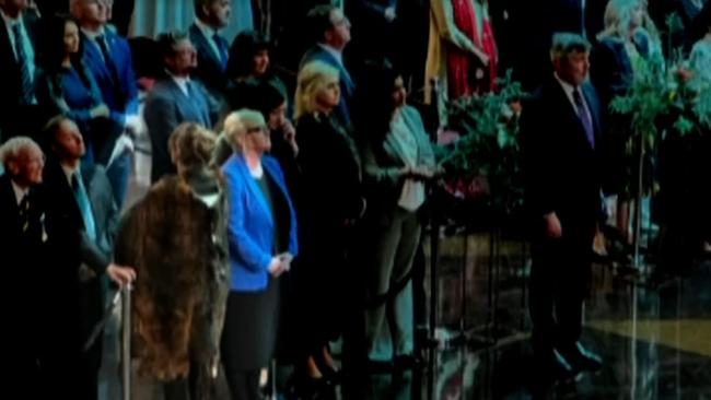 Senator Lidia Thorpe turns her back to the stage during the Parliamentary reception for King Charles