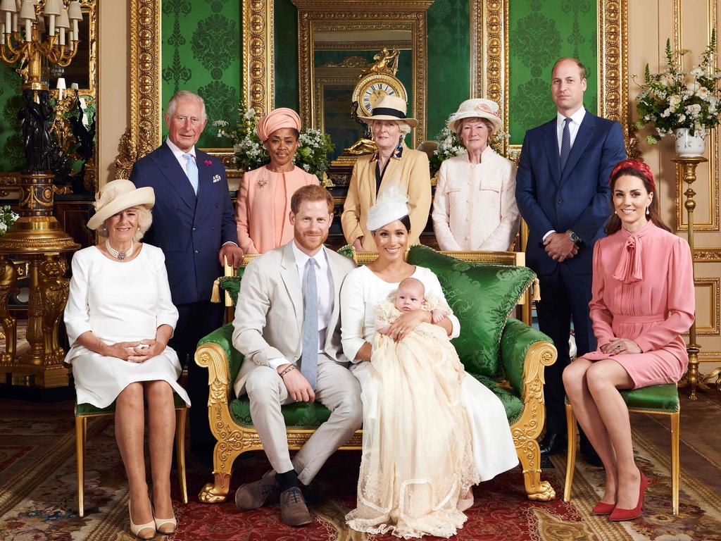 Prince Harry and Meghan, centre, with baby Archie on his christening day in the Green Drawing Room at Windsor Castle. Picture: AFP