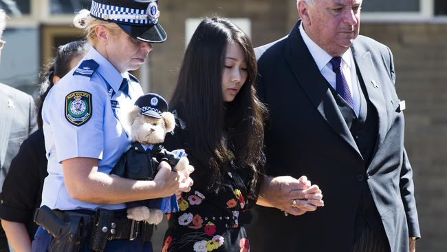 Dianne Proctor placed a police teddy on her husband’s coffin. Picture: Dylan Robinson