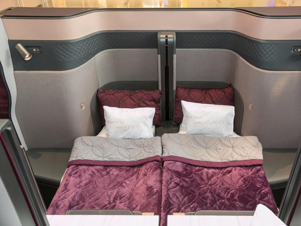 There’s movable panels that allow you to transform your space into a social area, allowing you to work, dine or socialise at 40,000 feet. Picture: Qatar Airways