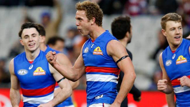 Mitch Wallis celebrates a Bulldogs goal.