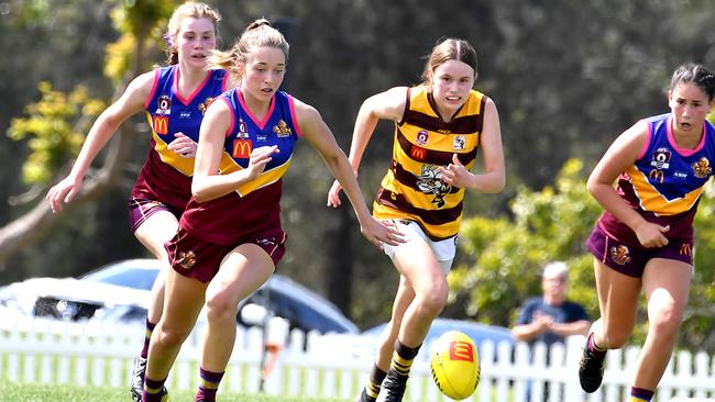 This shot captured the desperate nature of the Aspley Vs Morton Bay girls AFLQ Youth Grand Final clash. Saturday September 4, 2021. Picture, John Gass