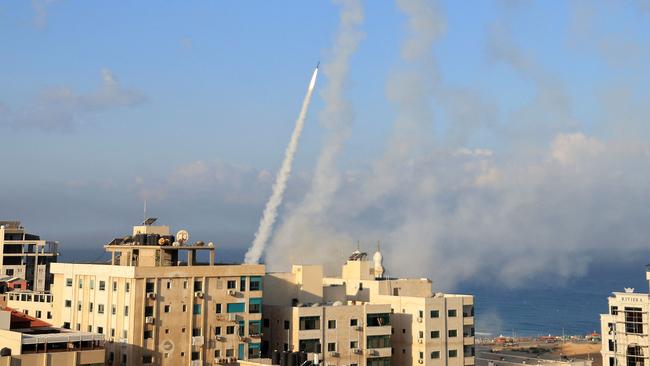 Rockets are fired from Gaza City towards Israel on October 7. Picture: Mahmud Hams / AFP